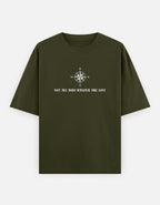 Green t-shirt with compass design and text on a white background